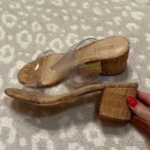 Women’s Schutz cork heeled clear strap sandals.